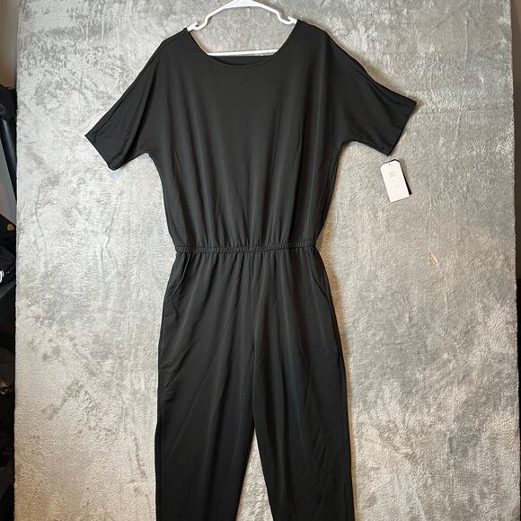 Clara Sun Woo Back‎ Cut Out Jogger Pocket Jumpsuit Size Medium New Black - Picture 1 of 9